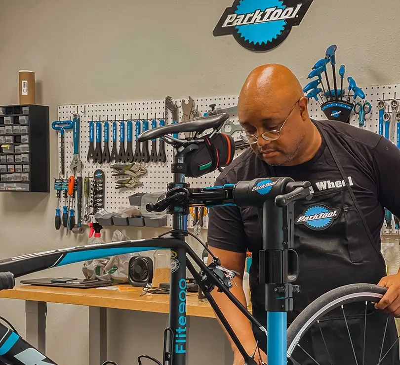 Big Wheel Bikes technician working on a bike